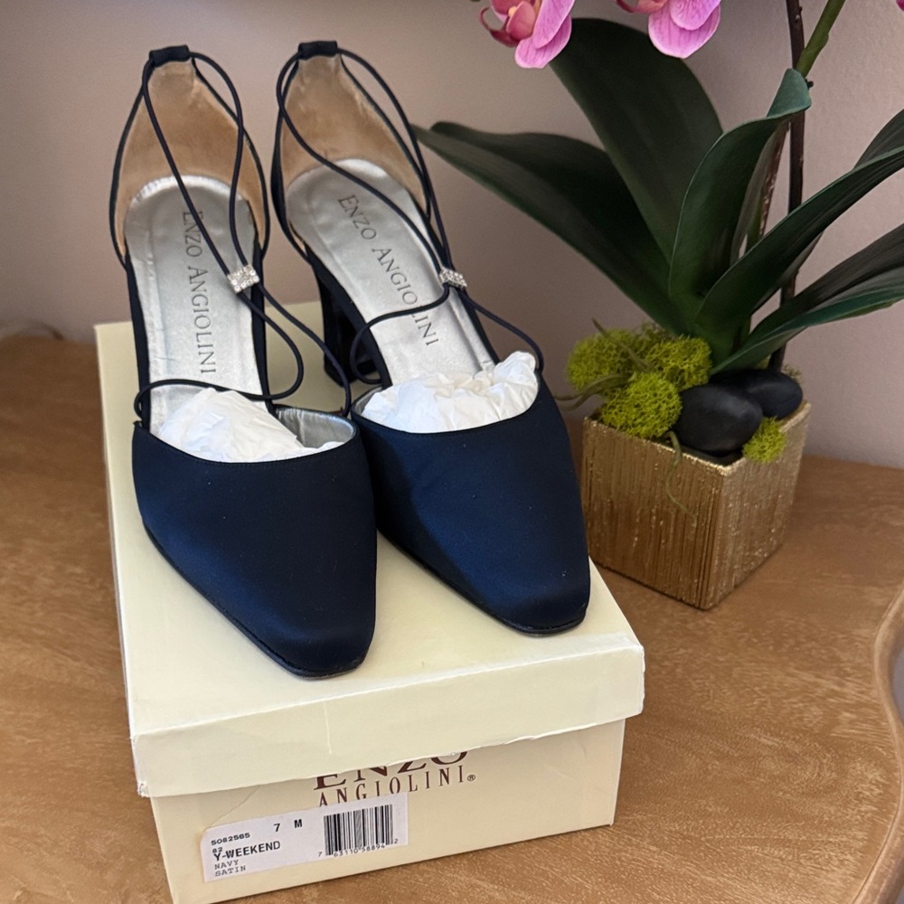 Navy Blue Satin Enzo Angiolini evening pumps with crystal detail.